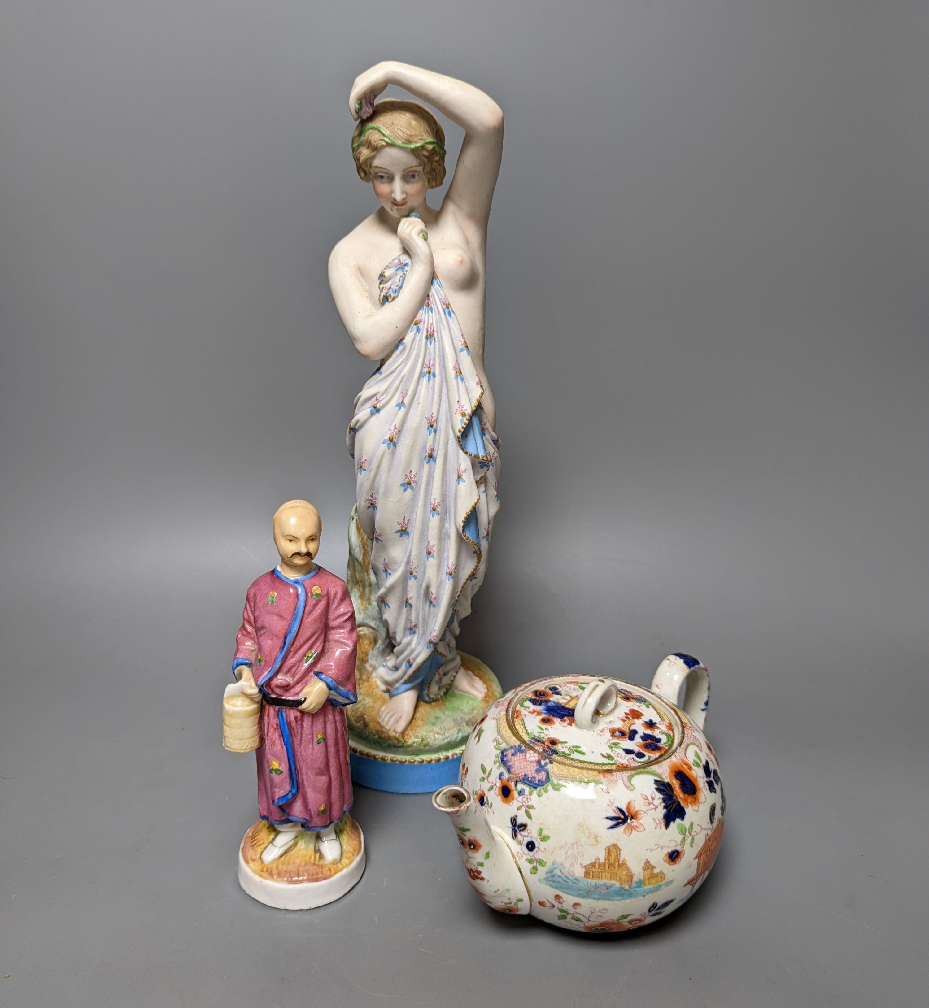 A 19th century French bisque classical female figure, Doulton Imari style teapot and a figure of an SPM porcelain figure of a Chinese man, base marked ‘SPM’. Tallest 34cm